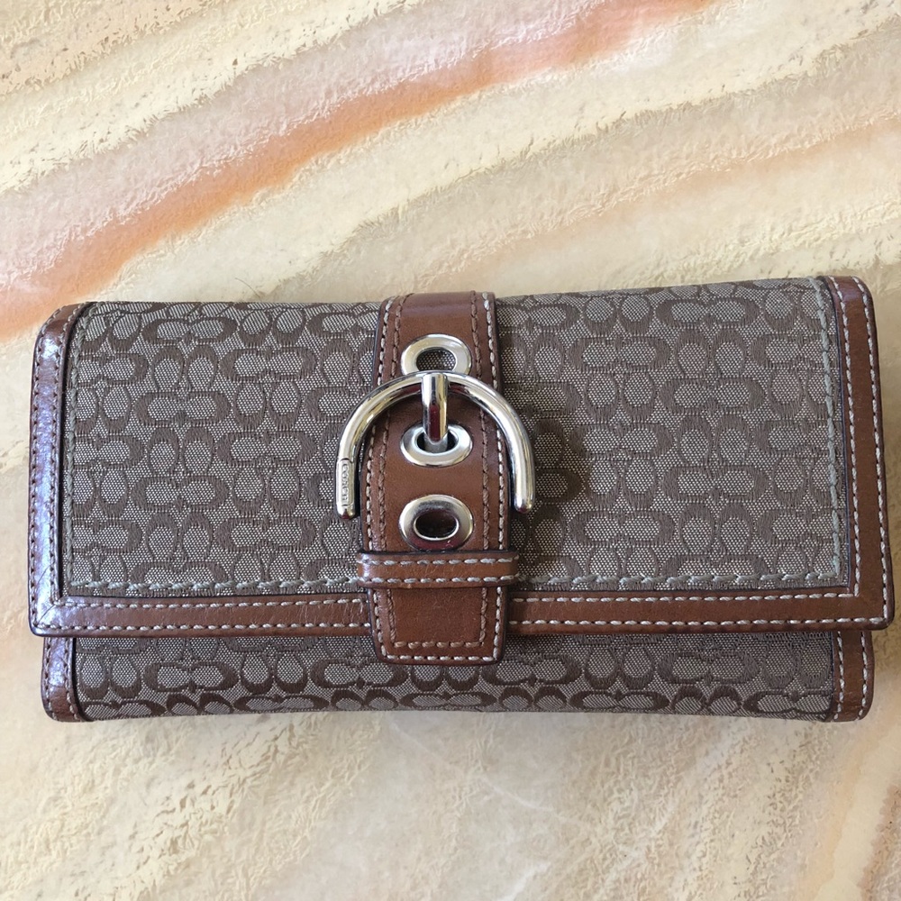 Brown Coach logo buckle tri-fold wallet